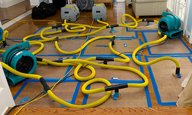 Professional Flood Damage Restoration technician working in Moxahala, OH